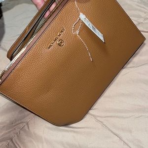Michael Kors clutch wrist bag leather camel colored